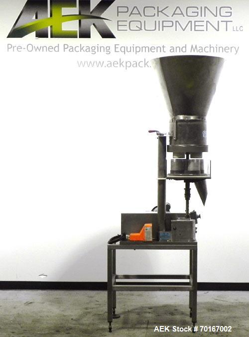 Used Spee-Dee BR-344 Volumetric Cup Filler. Capable of speeds up to 80 fills per minute. Has a 1.5 cubic foot stainless steel hopper. Cup size: diameter 4", length .62" to 12" with changeparts. Clutc...