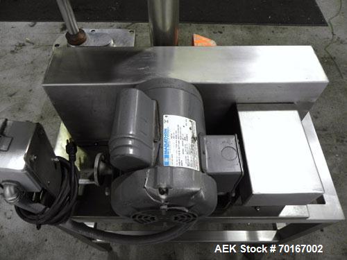 Used Spee-Dee BR-344 Volumetric Cup Filler. Capable of speeds up to 80 fills per minute. Has a 1.5 cubic foot stainless steel hopper. Cup size: diameter 4", length .62" to 12" with changeparts. Clutc...