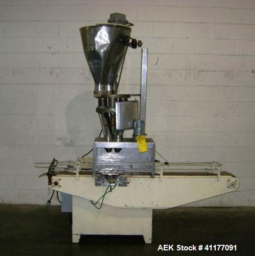 Used Spee-Dee Automatic Volumetric Cup Filler, Model CB4. Has 4 pockets with a dual discharge. Cup size range: diameter 1" to 4", height .62" to 12". Fill volume range: .5 to 170 cubic inches. Has st...