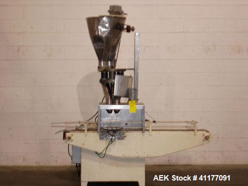 Used Spee-Dee Automatic Volumetric Cup Filler, Model CB4. Has 4 pockets with a dual discharge. Cup size range: diameter 1" to 4", height .62" to 12". Fill volume range: .5 to 170 cubic inches. Has st...