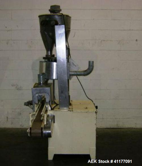 Used Spee-Dee Automatic Volumetric Cup Filler, Model CB4. Has 4 pockets with a dual discharge. Cup size range: diameter 1" to 4", height .62" to 12". Fill volume range: .5 to 170 cubic inches. Has st...