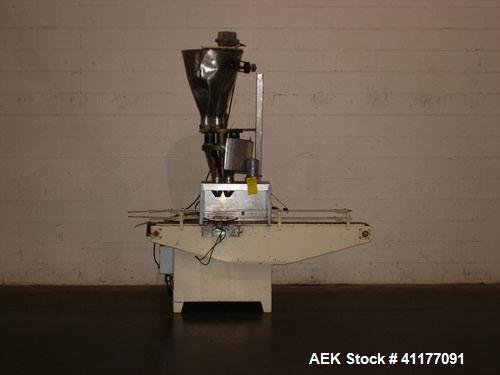 Used Spee-Dee Automatic Volumetric Cup Filler, Model CB4. Has 4 pockets with a dual discharge. Cup size range: diameter 1" to 4", height .62" to 12". Fill volume range: .5 to 170 cubic inches. Has st...