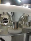 Used FEMC Model 1134 Angular Dial Volumetric Filler. Machine is capable of speeds up to 160 containers per minute. Hopper capacity: 1200 CU in. Product dispensing volume up to 50 CU IN. Designed for ...