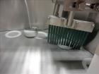 Used FEMC Model 1134 Angular Dial Volumetric Filler. Machine is capable of speeds up to 160 containers per minute. Hopper capacity: 1200 cubic inch. Product dispensing volume up to 50 cubic inch. Des...