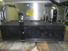 Used M&O Perry Model E1200 Vacuum Powder Filler. Capable of speeds up to 150 vial containers per minute. Container size range: (Diam) .75