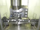 Used M&O Perry Model E1200 Vacuum Powder Filler. Capable of speeds up to 150 vial containers per minute. Container size range: (Diam) .75