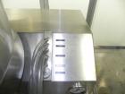 Used M&O Perry Model E1200 Vacuum Powder Filler. Capable of speeds up to 150 vial containers per minute. Container size range: (Diam) .75