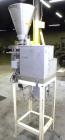 Used- Spee-Dee 4-Pocket Volumetric Cup Filler. Has approximately (4) 2