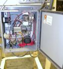 Used Spee-Dee 4-Pocket Volumetric Cup Filler. Has approximately (4) 2