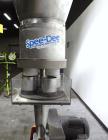 Used Spee-Dee BR-344 Volumetric Cup Filler. Capable of speeds up to 80 fills per minute. Has a 1.5 cubic foot stainless steel hopper. Cup size: diameter 4