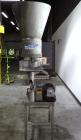 Used Spee-Dee BR-344 Volumetric Cup Filler. Capable of speeds up to 80 fills per minute. Has a 1.5 cubic foot stainless steel hopper. Cup size: diameter 4