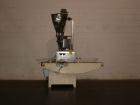 Used Spee-Dee Automatic Volumetric Cup Filler, Model CB4. Has 4 pockets with a dual discharge. Cup size range: diameter 1