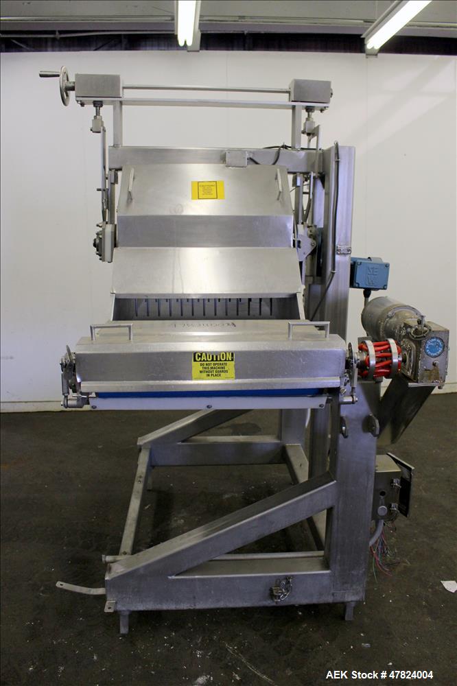 Used Waterfall Cheese/Applicator for Pizza, 304 Stainless Steel. Has 28" wide x 60" long belt conveyor driven by a 1/2hp, 3/60/208-230/460 volt, 1725 rpm washguard gear motor (no ratio). Approximate ...