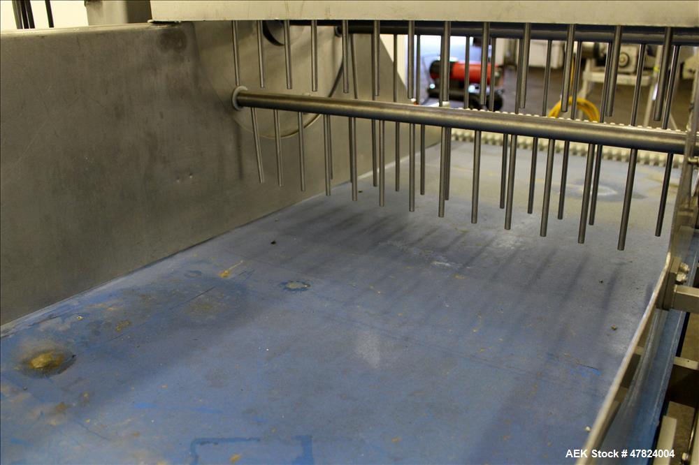 Used Waterfall Cheese/Applicator for Pizza, 304 Stainless Steel. Has 28" wide x 60" long belt conveyor driven by a 1/2hp, 3/60/208-230/460 volt, 1725 rpm washguard gear motor (no ratio). Approximate ...