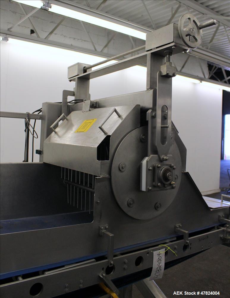 Used Waterfall Cheese/Applicator for Pizza, 304 Stainless Steel. Has 28" wide x 60" long belt conveyor driven by a 1/2hp, 3/60/208-230/460 volt, 1725 rpm washguard gear motor (no ratio). Approximate ...