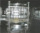 USED: FMC combination filler and seamer. Stainless steel unitmounted on a deluxe stainless steel common base. FMC seamer model659-HCM consists of six station, driven lifter, connected to an FMCfiller...