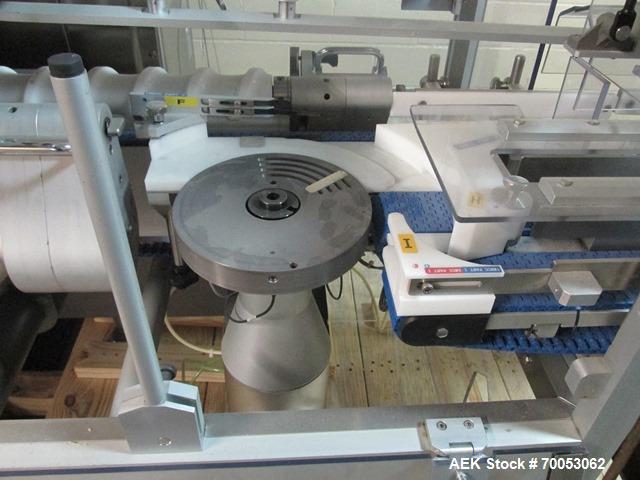 Used Used IMA electronic vision counter, model Conta C300, dual filling heads with vision system, presently set up for 100 cc bottles with Allen Bradley Logic 5561 plc controller and Allen Bradley Ve...