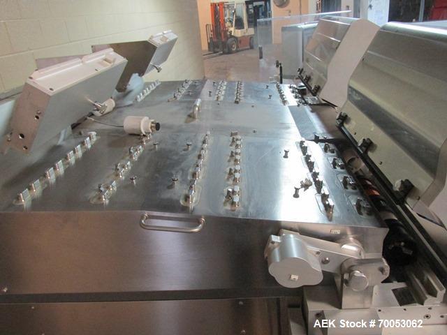 Used Used IMA electronic vision counter, model Conta C300, dual filling heads with vision system, presently set up for 100 cc bottles with Allen Bradley Logic 5561 plc controller and Allen Bradley Ve...