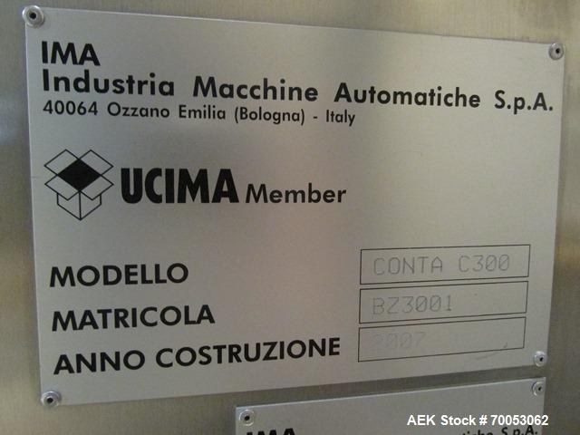 Used Used IMA electronic vision counter, model Conta C300, dual filling heads with vision system, presently set up for 100 cc bottles with Allen Bradley Logic 5561 plc controller and Allen Bradley Ve...