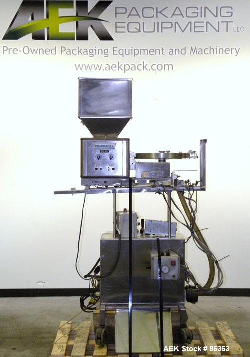 Used Deitz Company Versacount Tablet/Capsule Counter/Bottle Filler, Model FF 714R. 16" diameter turntable, feed hopper with vibratory feeder. Approximately 2400 tablets per minute. Includes a model A...