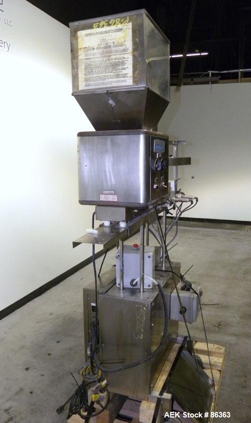 Used Deitz Company Versacount Tablet/Capsule Counter/Bottle Filler, Model FF 714R. 16" diameter turntable, feed hopper with vibratory feeder. Approximately 2400 tablets per minute. Includes a model A...