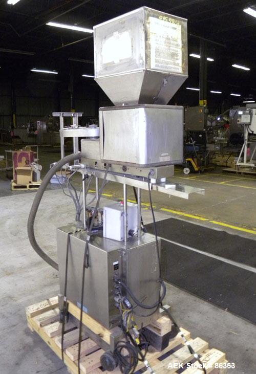 Used Deitz Company Versacount Tablet/Capsule Counter/Bottle Filler, Model FF 714R. 16" diameter turntable, feed hopper with vibratory feeder. Approximately 2400 tablets per minute. Includes a model A...