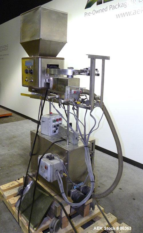 Used Deitz Company Versacount Tablet/Capsule Counter/Bottle Filler, Model FF 714R. 16" diameter turntable, feed hopper with vibratory feeder. Approximately 2400 tablets per minute. Includes a model A...