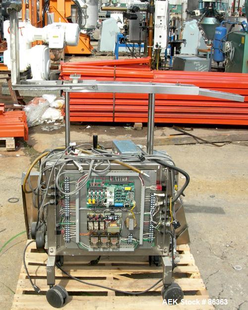 Used Deitz Company Versacount Tablet/Capsule Counter/Bottle Filler, Model FF 714R. 16" diameter turntable, feed hopper with vibratory feeder. Approximately 2400 tablets per minute. Includes a model A...