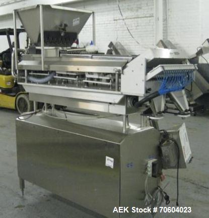 Used Kalish Swiftpack Model SPC 8PD Electronic Tablet Counter.  Unit has 8 tracks, dual discharge and is a three tray design.  Set up for pin indexing, serial# M784.