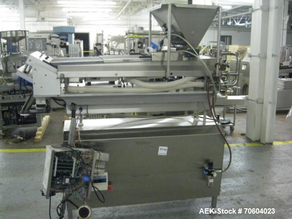Used Kalish Swiftpack Model SPC 8PD Electronic Tablet Counter.  Unit has 8 tracks, dual discharge and is a three tray design.  Set up for pin indexing, serial# M784.