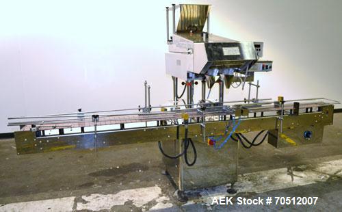 Used King Model TC8 Electronic Tablet Counter. Capable of speeds up to 60 bottles per minute depending on count and container size. Has two trays with 8 channels, pin indexing system and conveyor. Du...