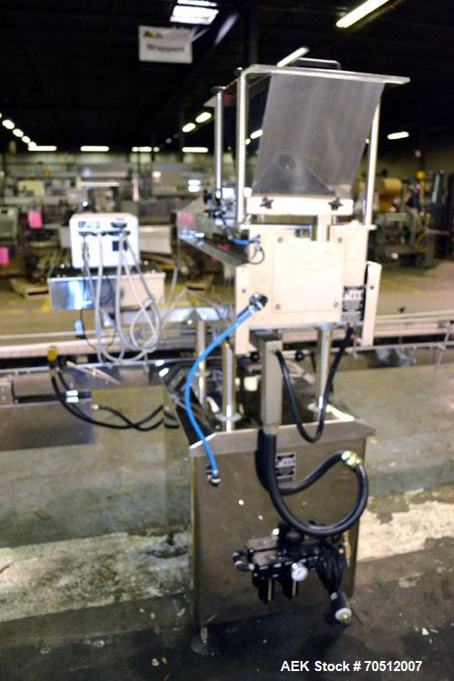 Used King Model TC8 Electronic Tablet Counter. Capable of speeds up to 60 bottles per minute depending on count and container size. Has two trays with 8 channels, pin indexing system and conveyor. Du...
