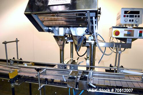 Used King Model TC8 Electronic Tablet Counter. Capable of speeds up to 60 bottles per minute depending on count and container size. Has two trays with 8 channels, pin indexing system and conveyor. Du...