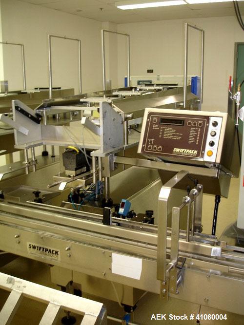 Used Kalish Swiftpack Lane Counter, Model SPC16P, stainless steel construction. 16 lane, two stage, on adjustable height base with controls, serial #M501.