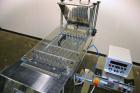 Used King Model TC8 Electronic Tablet Counter. Capable of speeds up to 60 bottles per minute depending on count and container size. Has two trays with 8 channels, pin indexing system and conveyor. Du...
