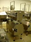 Used Kalish Swiftpack Lane Counter, Model SPC16P, stainless steel construction. 16 lane, two stage, on adjustable height base with controls, serial #M501.