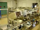 Used Kalish- Swiftpack Lane Counter, Model SPC16P, stainless steel construction. 16 lane, two stage, on adjustable height base with controls, serial 
#M502.