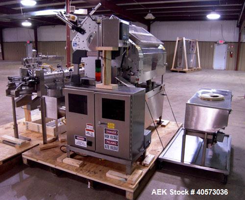 Used Merrill Model 72 39 AH Dual Lane Slat Counter. Has dual screw indexing system, AB PLC controls, pin discharge and dual lane gating conveyor.sn 588