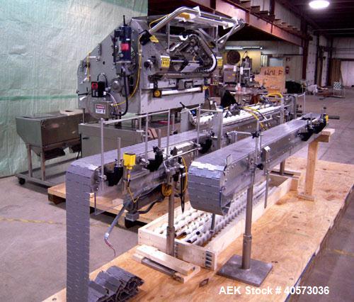 Used Merrill Model 72 39 AH Dual Lane Slat Counter. Has dual screw indexing system, AB PLC controls, pin discharge and dual lane gating conveyor.sn 588