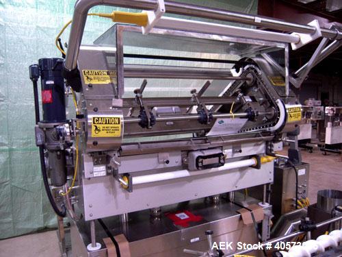 Used Merrill Model 72 39 AH Dual Lane Slat Counter. Has dual screw indexing system, AB PLC controls, pin discharge and dual lane gating conveyor.sn 588