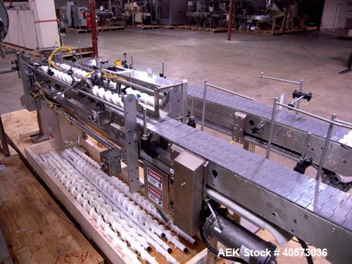 Used Merrill Model 72 39 AH Dual Lane Slat Counter. Has dual screw indexing system, AB PLC controls, pin discharge and dual lane gating conveyor.sn 588