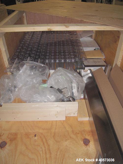 Used Merrill Model 72 39 AH Dual Lane Slat Counter. Has dual screw indexing system, AB PLC controls, pin discharge and dual lane gating conveyor.sn 588