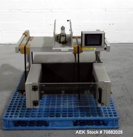 Used Aylward Capsule Feeder Station 