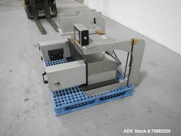 Used Aylward Capsule Feeder Station 