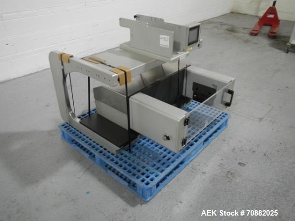 Used Aylward Capsule Feeder Station 