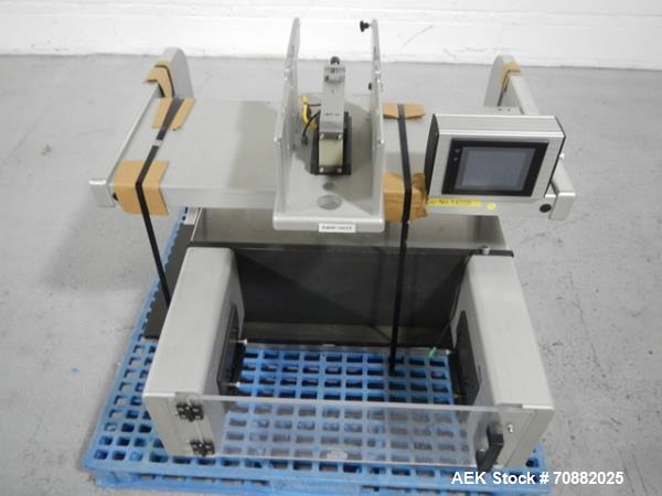Used Aylward Capsule Feeder Station 