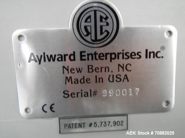 Used Aylward Capsule Feeder Station 