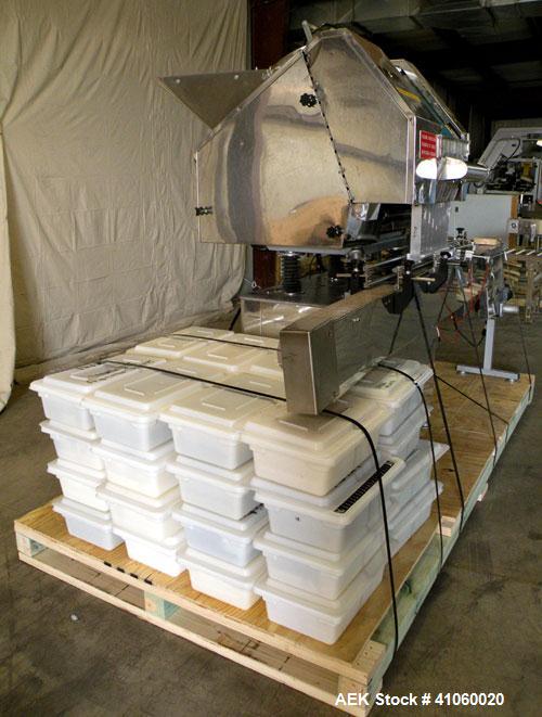 Used King SC6L Tablet or Capsule Slat Counter capable of speeds up to 120 bottles per minute. Has pin indexing with 4" wide x 114" long table top chain indexing conveyor. Tablet size range: 3 - 25mm....