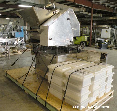 Used King SC6L Tablet or Capsule Slat Counter capable of speeds up to 120 bottles per minute. Has pin indexing with 4" wide x 114" long table top chain indexing conveyor. Tablet size range: 3 - 25mm....