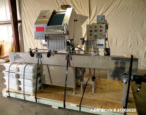 Used King SC6L Tablet or Capsule Slat Counter capable of speeds up to 120 bottles per minute. Has pin indexing with 4" wide x 114" long table top chain indexing conveyor. Tablet size range: 3 - 25mm....